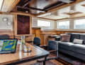 Salon: The dark red leather of the front is heavily textured and, like the vinyl floor, appears again and again