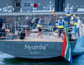 A 4.50 metre tender is parked at the rear. With the platform folded down, there is an 8.5 square metre beach area