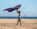 Release the back hand and let the wing hover in the neutral position above your head
