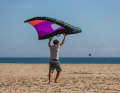 Prepare to turn round by releasing the pressure - open the wing with your back hand