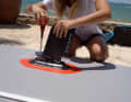 A large centre fin is designed to prevent lateral drift in light winds