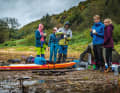 "The rain and wind really got to me, but paddling with friends - and sitting around the campfire together at the end of the day with dinner from the bag - makes you forget that quickly." (Emely Siewert)