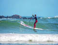 With the right technique, you can overcome large rolls of water and waves. Speed is important. Paddle at speed, bow to the wave (image 1).