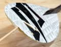 Mid-range paddle blades often consist of a foam core with a glass fibre laminate. This can crack if handled roughly. You will need epoxy resin, sandpaper, a brush, scales, a beaker, gloves and two to four clamps for the repair.