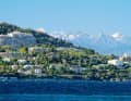 Although the Maritime Alps tower over Cannes, the celebrity city is spared the strong winds - something stand-up paddlers love to hear.