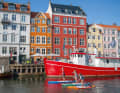 Everything is so colourful here, Phine, Paulina and Kai visiting Copenhagen's Nyhaven.