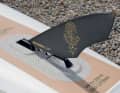 The Indiana Touring Race fin sits in the split fin box. This makes it easier to roll the board in.