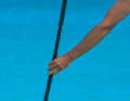 The arm should remain stretched during the pulling phase.