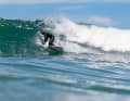 Andy and his boards clearly feel at home in the waves of Cape Town.