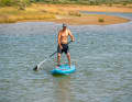 For example, if you are paddling on the right-hand side, you bring the paddle down while maintaining the same hand position...