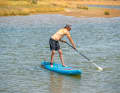 With this support on the water, which slows the board down slightly, you tighten your abdominal muscles, put weight on your inner leg and...