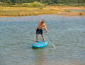 In particular, the leg on the side of the paddle is heavily used