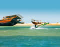The backdrop in Masirah City is exceptional, as are the surfing conditions with flat water, 35 degree air and 30 degree water