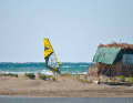 On the windward side of the headland in Tsimari, small waves sometimes run onto the beach.