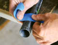 3. mark the cutting edge: As a guide for the saw, stick solid crepe along the later cutting edge - hence the markings. If both ends of the crepe meet without any offset, you can be sure that the cutting mark is exactly straight. Glue on two to three additional layers of crepe as accurately as possible; the bottom edge of the crepe also forms a helpful guide for the saw. "Incidentally, fabric tape is unsuitable for masking," emphasises Oliver, "because it's a bit soft and can be stuck around curves - it's not ideal for getting a straight edge."