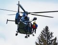 Seine eigentliche Liebe sind die Berge und Seen (hier am Heli bei einer Bergrettungsübung).