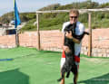 Always with him, his self-trained guide dog Thor.