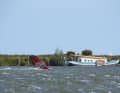 Chris Hafer is feeling good and jibes off the harbour of Andijk.