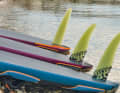 Series fins: As the performance character increases, the fins become longer, narrower and thinner. Magic Ride (centre), Super Sport (rear), Super Ride (front).