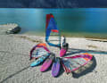 A comfortable freeride board with a camberless sail is the starting position. Faster boards, sails and fins are available for upgrading.