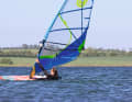 In principle, the sail is already in the upright travelling position while the rider is still in the water