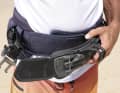 Plastic tabs are pushed into the side of the harness when tightening and hold the hook firmly in position
