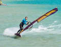 To minimise the pressure, pull the sail back slightly.