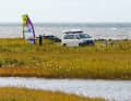 From the car park at the spot you have a choice: shallow water in the lagoon or Baltic Sea waves on the western side of the headland.