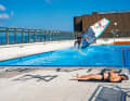 Twelve metres of approach on the wooden ramp and half a pool length are enough for Matissek to accelerate to 50 km/h