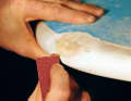 Repaired boards are cheap and can last a long time - if the damage has been repaired professionally