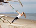 Grasp the handles with both hands, straighten your body and straighten your arms