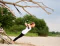 Slowly bend your arms until you are between the handles. Maintain body tension and slowly "press" back to the starting position