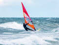 3. open the sail wide, front hand towards the mast