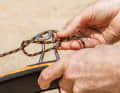 5. ... you can now push a trimming aid, for example your harness hook or a screwdriver, through ...
