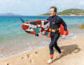 If your arms are long enough, simply clamp the board under your arm with the deck facing your body