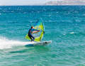 Make sure you have a wide grip on the boom, an outstretched front arm...