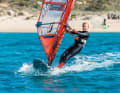 Those who surf with a harness protect their arms and can transfer power better