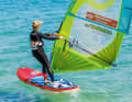 The board now begins to turn to windward. This course at an angle to the wind is known as an upwind course.