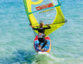 During the drop, the sail draft increases noticeably, your board accelerates and turns onto the fastest course in windsurfing - this course diagonally away from the wind is known as a space wind course. Important: Do not avoid the rising sail draft during the drop by opening the sail, but keep your sail hand tight and use your body weight to avoid being pulled forwards over the board! If you want to continue on the downwind course, put the sail back into the normal riding position with the boom horizontal.