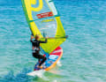 If you drop further, your board will turn directly to leeward. On this downwind course, the sail pull and speed decrease noticeably.