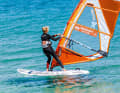 You can tell that your board has turned completely into the wind by the fact that the speed is getting closer and closer to zero and the bow is pointing directly into the small wind waves. You have already completed the first 90 degrees of the tack.