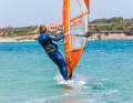 After luffing, find a fixed point that you consistently aim for - this should be visibly further upwind than the course the board was on at the start, but not too far upwind either. If your board turns back to leeward, counter-steer by luffing slightly. If your board unintentionally turns further and further into the wind, make sure to bring the boom back into a horizontal position after luffing to prevent your board from stalling.