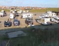 A colourful bunch of surfers almost always meet here, and there is also a small sanitary building. What more do you need?