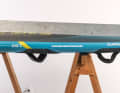 The gliding surface is not particularly long, but it is flat and does not curve up to the tail.