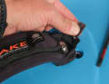 Top: The foot straps can be tightened particularly well with Torx screws