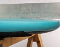 About one centimetre of "rocker" ensures good turning characteristics and requires a little more sail draft for planing.