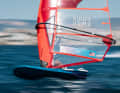 The logos and lettering on the sails and boards are missing