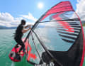 You can jibe closer around the buoy (in the sail window) than around any living camera holder, and even jump over it if in doubt.