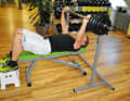 Then push them straight back up again. It is important that you keep your shoulders on the bench and always keep them pulled slightly towards your buttocks.