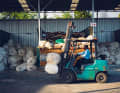 Fibre mats are moved from the warehouse to production by forklift truck